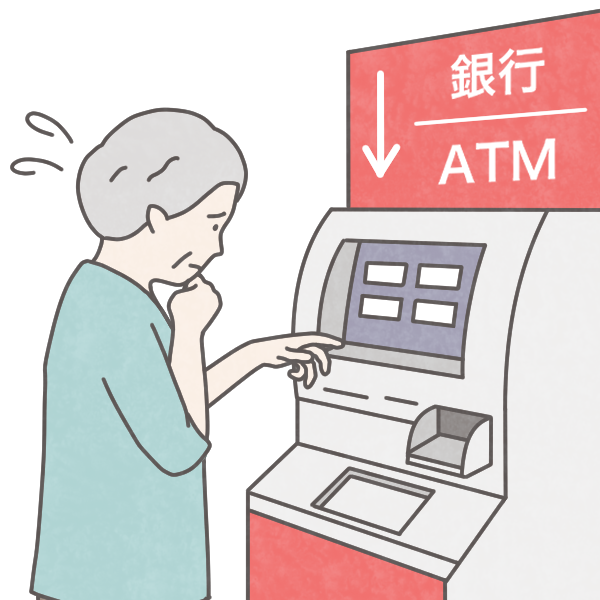 ATMの操作に苦戦する女性
